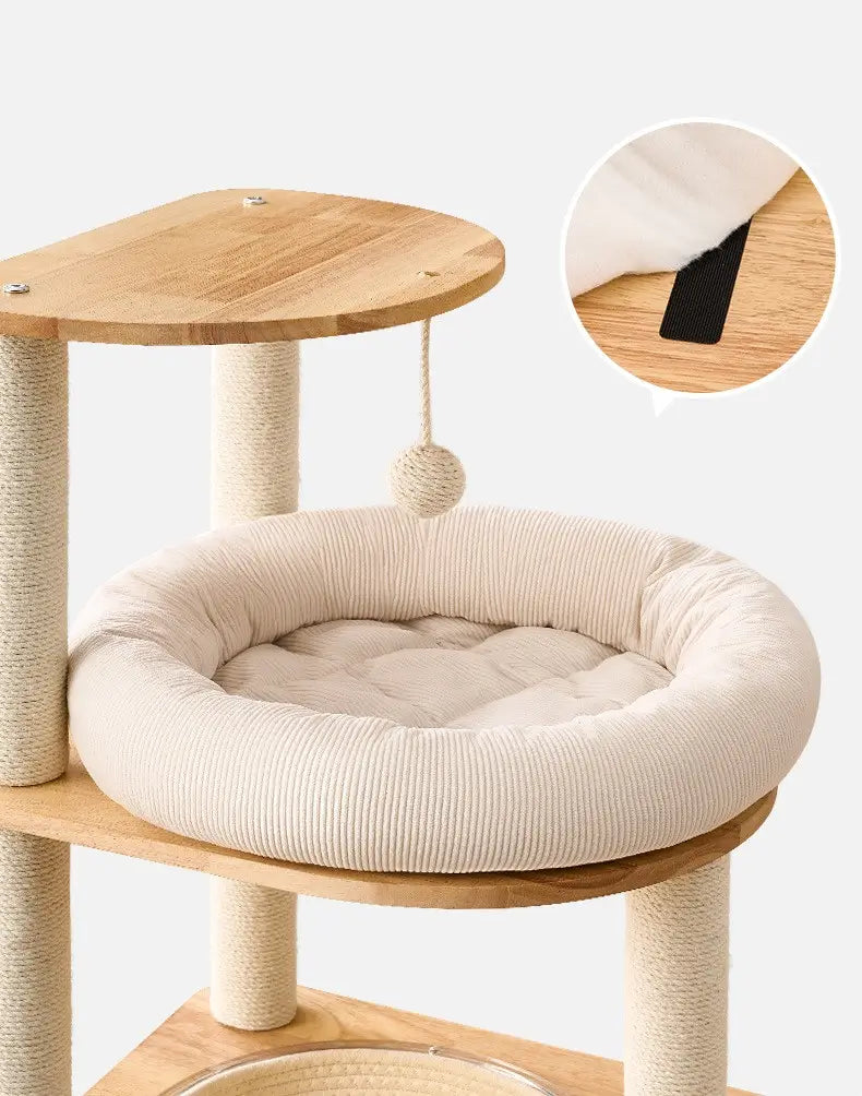 H02 wooden cat tree elevated cream plush cat bed with hanging sisal toy ball and removable cushion secured by a fastening strap.