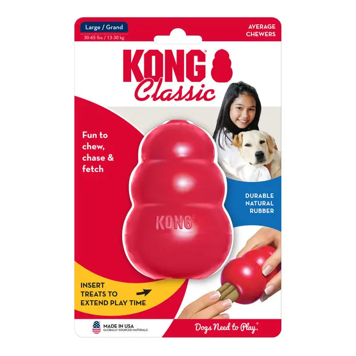 KONG Classic red natural rubber chew toy in original retail packaging, featuring a treat-stuffable design for average chewers.