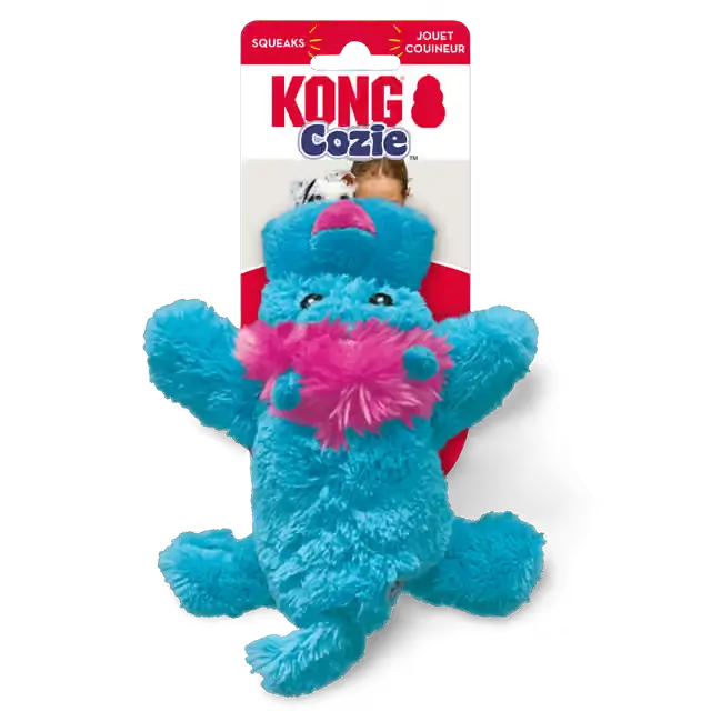KONG Cozie blue and pink plush dog toy displayed with original KONG Cozie packaging, featuring a soft cuddly design and built-in squeaker.