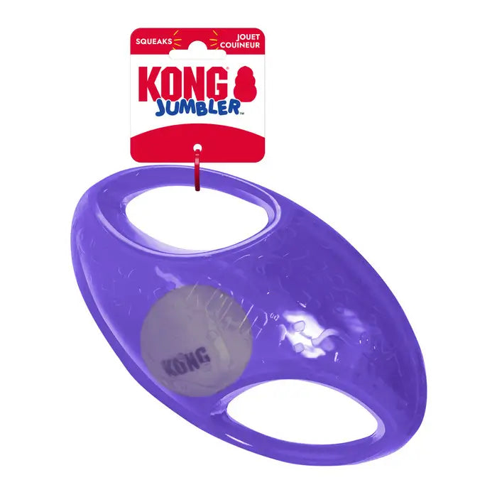 Purple KONG Jumbler Football Dog Toy with original KONG packaging, built-in squeaker and easy-grip handles for interactive fetch and play.