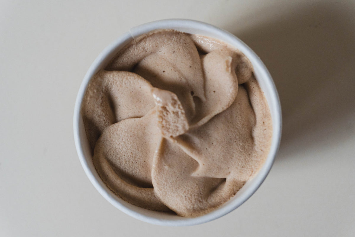 Dog Yog Rocky Road dog ice cream, open pot showing the frozen swirl