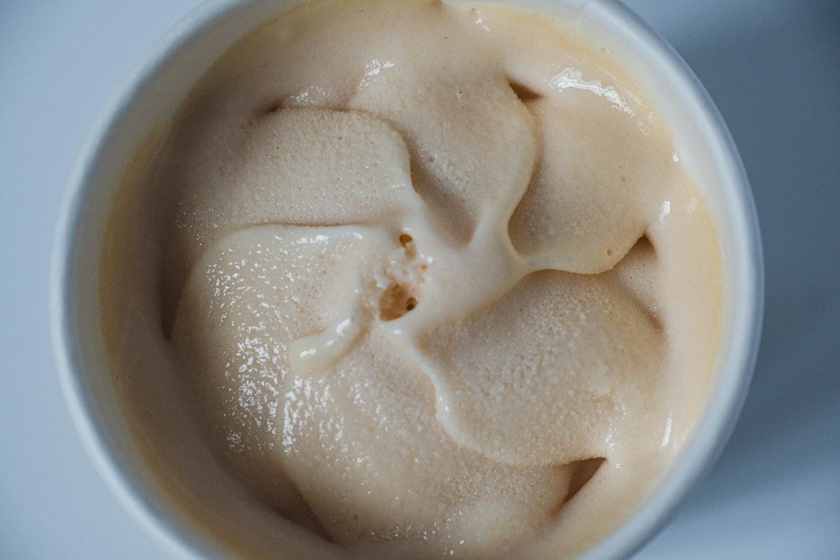 Dog Yog Strawberry Dreams dog ice cream, open pot showing the frozen swirl